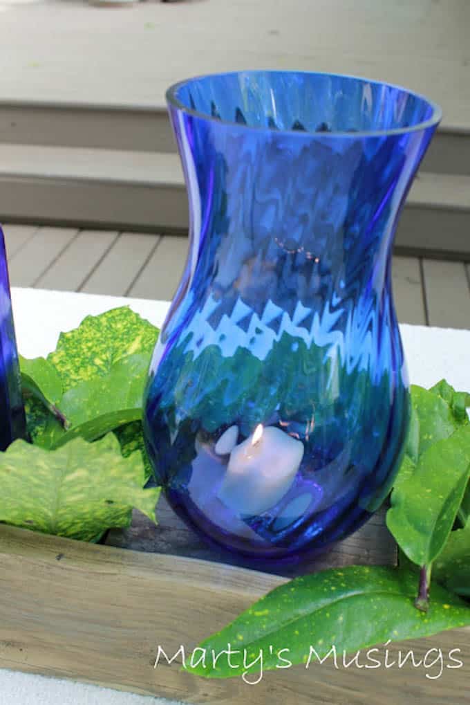 Centerpiece with Blue Glass Bottles