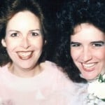 two sisters in wedding attire