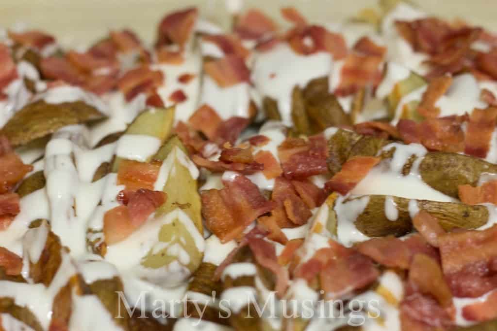 Potato Skins Loaded with Sour Cream/Ranch Sauce, Cheese and Bacon