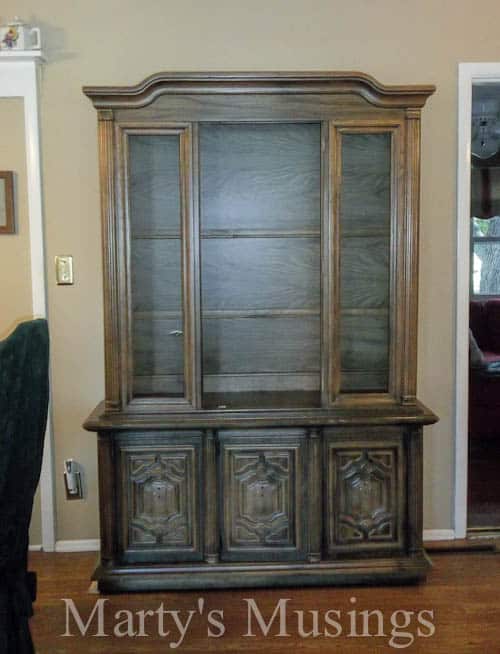 A room filled with furniture and a large window