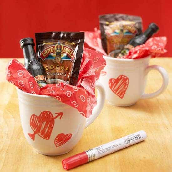 Heart coffee mugs filled with hot chocolate