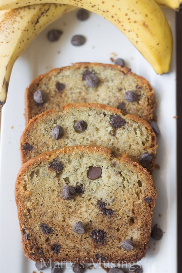 Chocolate Chip Banana Bread on plate with banana - Marty's Musings