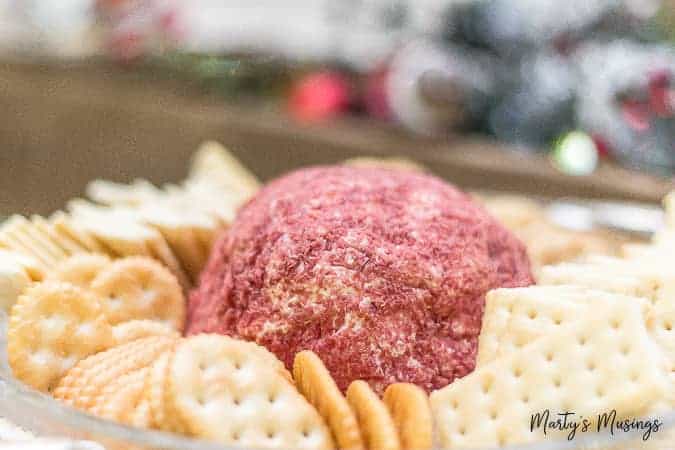 cheese ball covered with dried beef with crackers