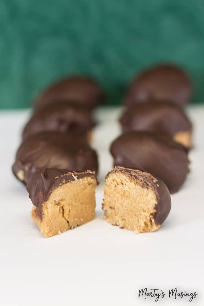 Chocolate Peanut Butter Truffles are the perfect treat when you need to totally impress your guests but don't want to spend a lot of time or money!