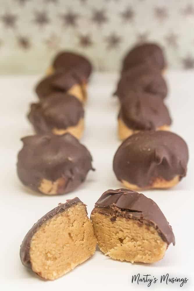 Chocolate Peanut Butter Truffles are the perfect treat when you need to totally impress your guests but don't want to spend a lot of time or money!