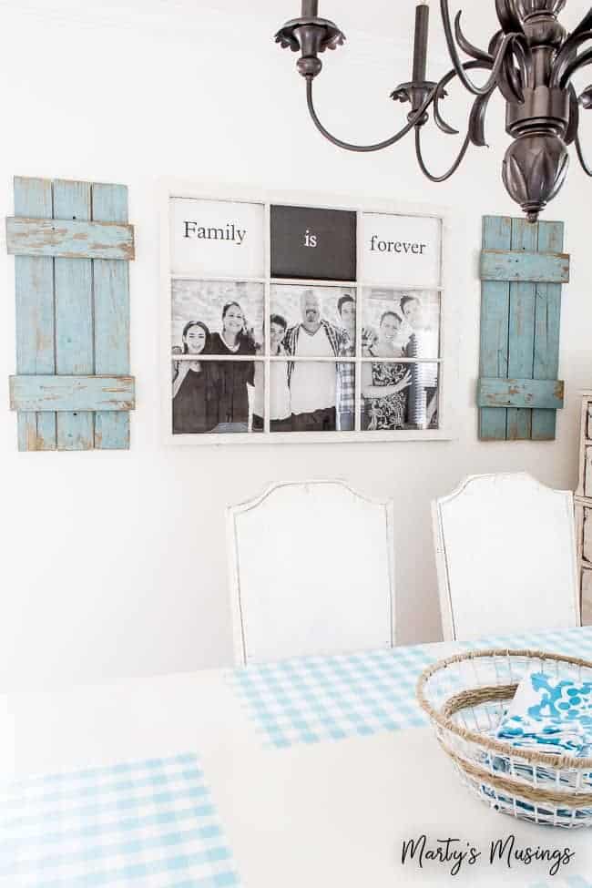 old window frame with family picture and chalk painted shutters