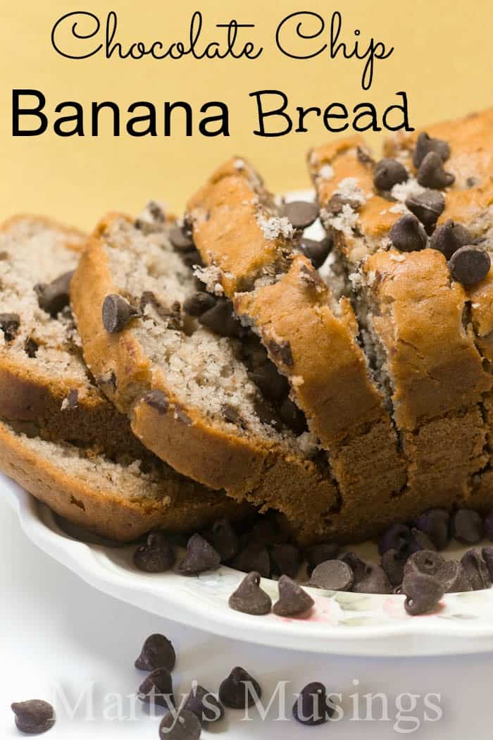 A piece of cake on a plate, with Bread and Banana