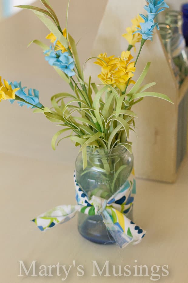 A bouquet of flowers in a vase on a table