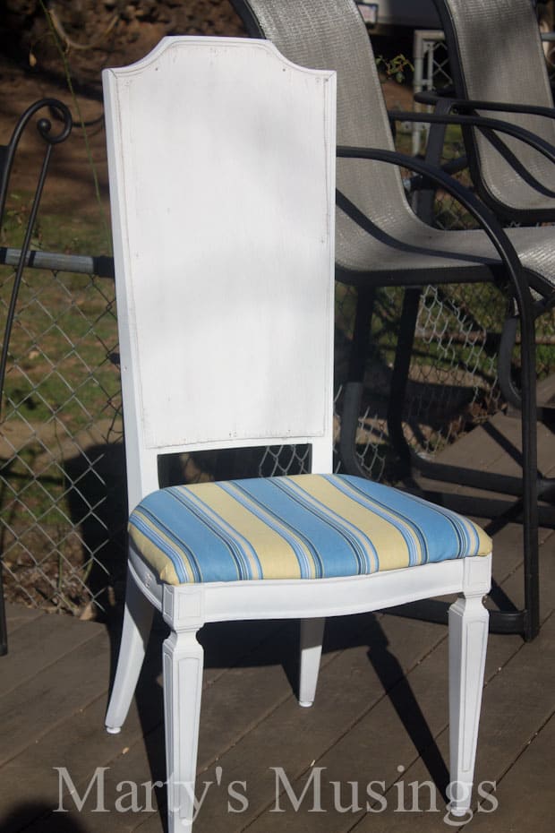 A chair sitting in front of a table