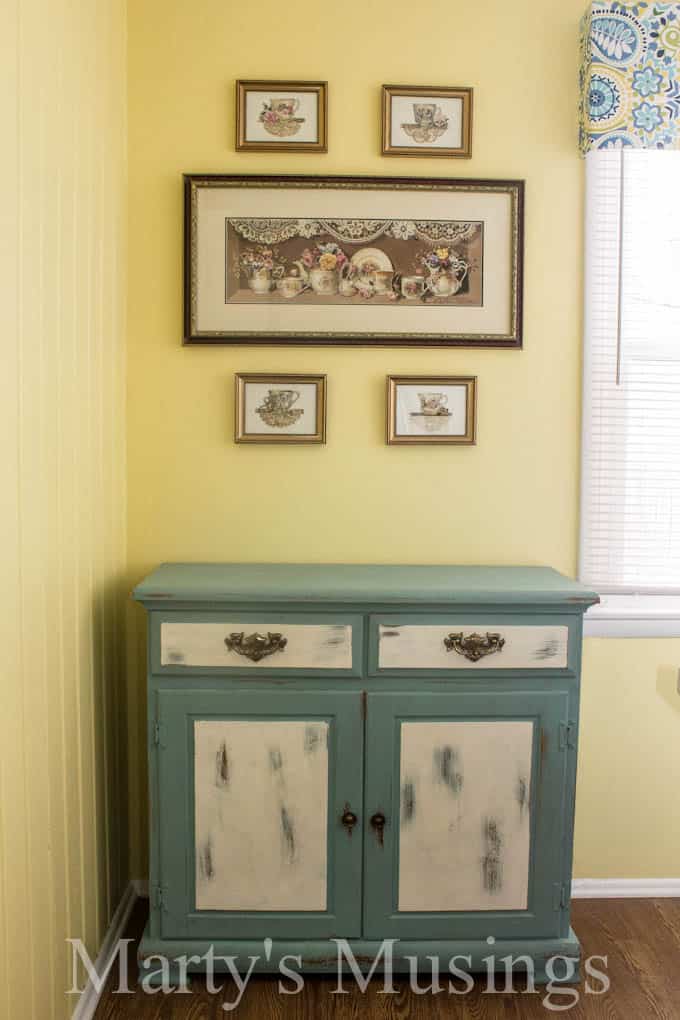 Chalk Painted Kitchen Buffet conceals the pet food! From Marty's Musings