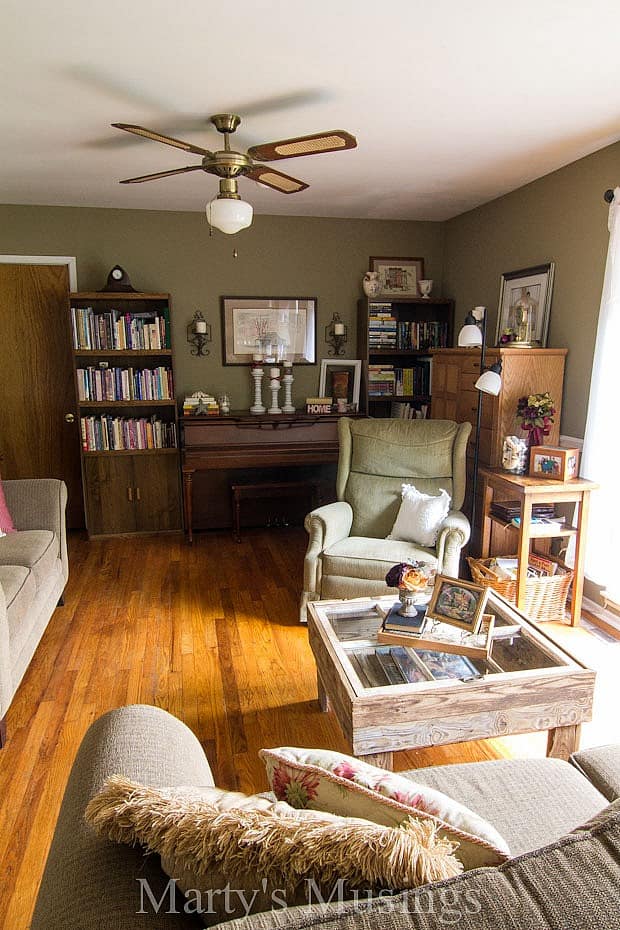 A living room filled with furniture and a fireplace