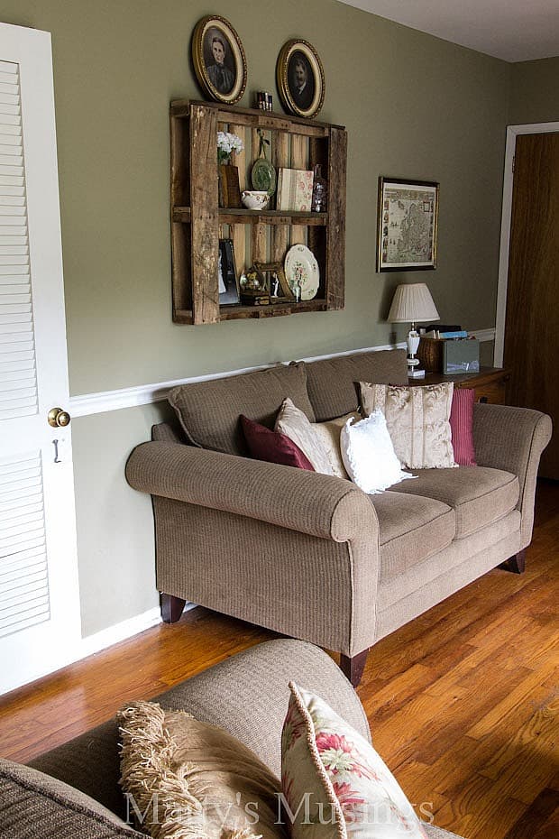 A living room filled with furniture and a fire place