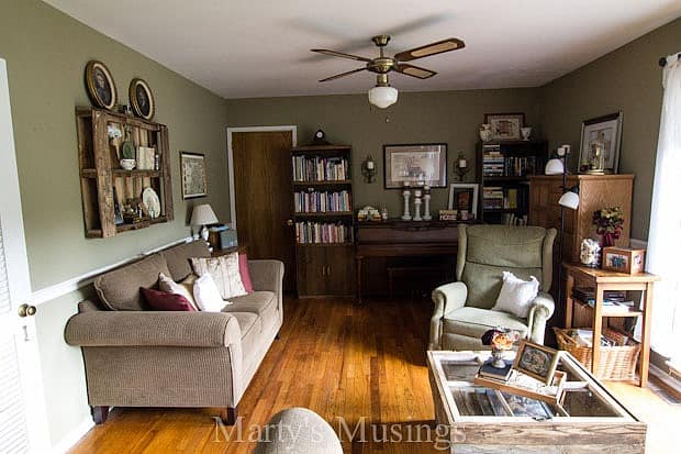 A living room filled with furniture and a fire place