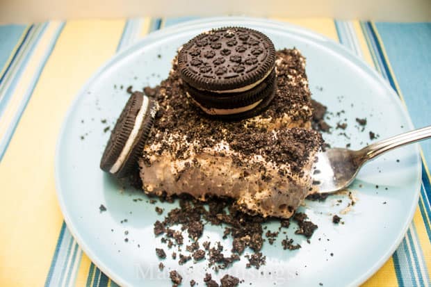 Chocolate Mousse Cheesecake on plate with fork and oreos