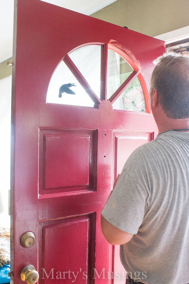 A man standing in front of a door