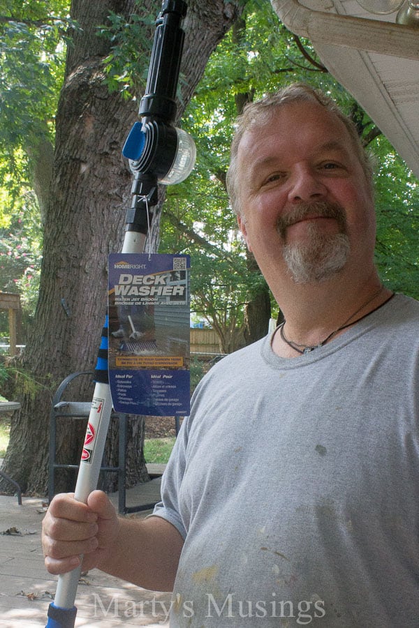 A man holding a toothbrush