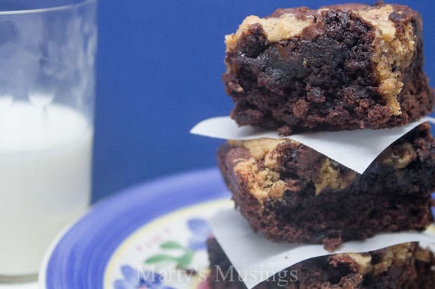 A piece of cake on a plate, with Chocolate and dough