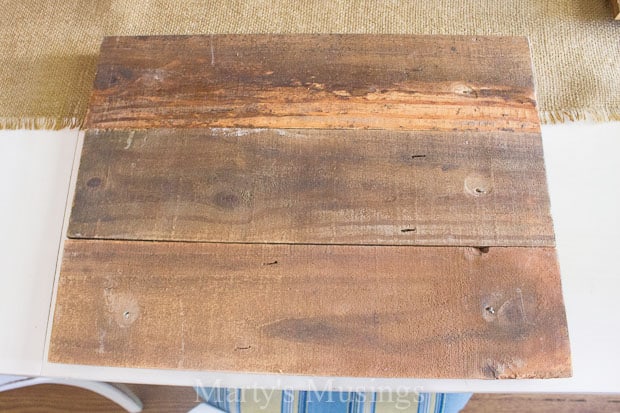 A wooden cutting board, with Charger and Table