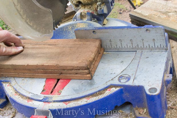 A wooden cutting board, with Charger and Table