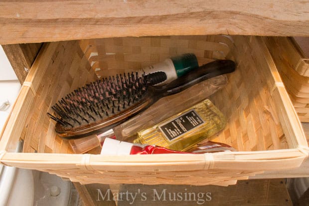 A container with a basket on a wooden table