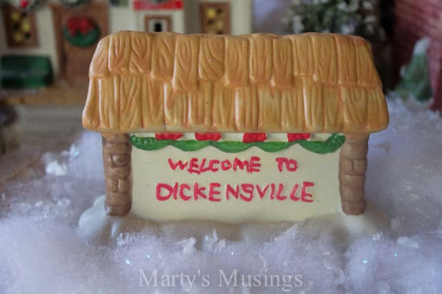 Welcome to Dickensville sign on miniature Christmas village
