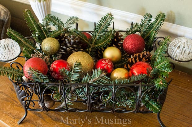 A bowl of fruit on a table, with Home and Tree