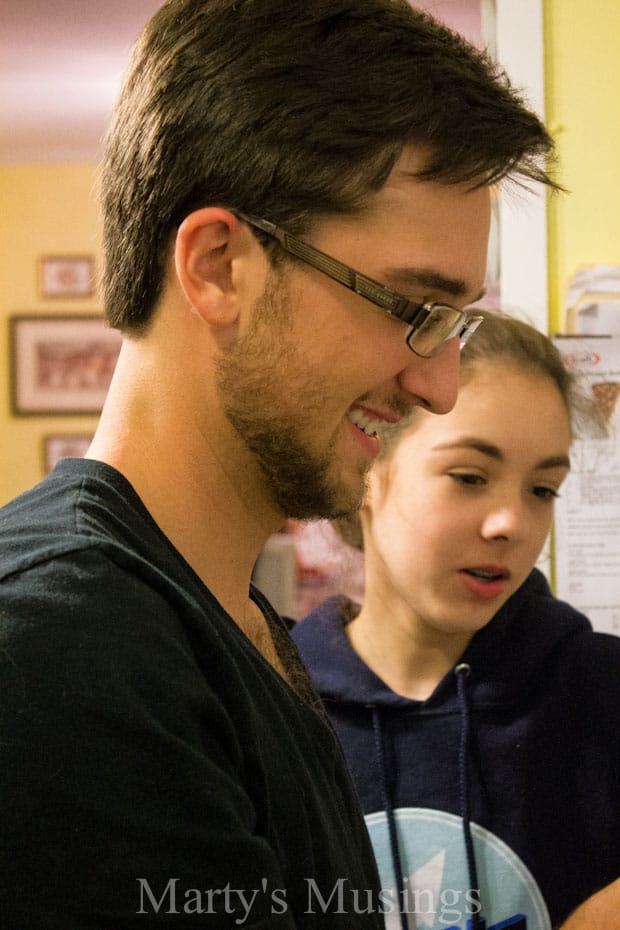 A man in glasses looking at the camera