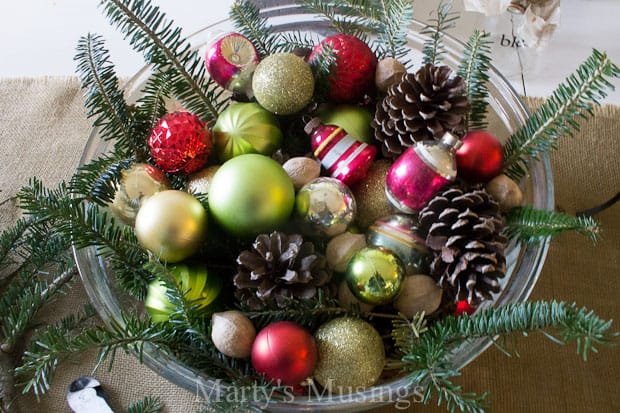 A bowl of fruit on a table, with Ornament and Thrifty