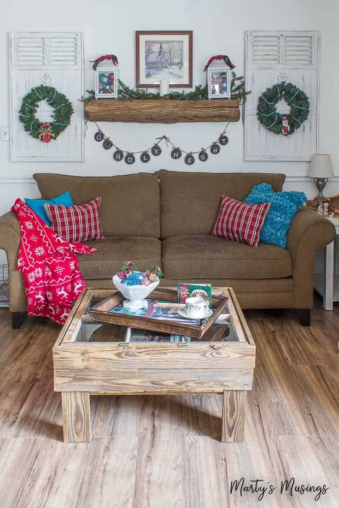 A living room filled with furniture on top of a wooden table