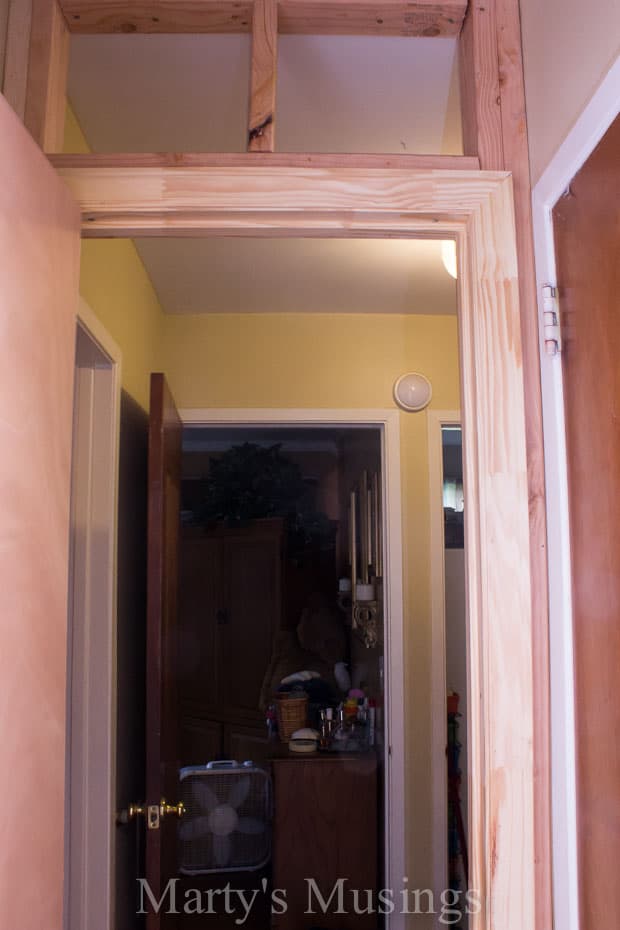 A door with a window and mirror