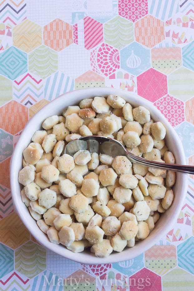 A bowl of food on a table, with Oyster cracker