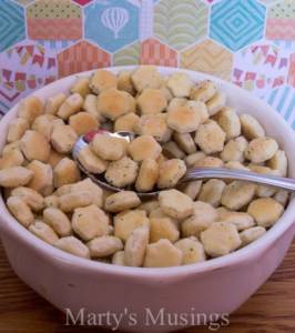 A bowl of food, with Cracker and Oyster