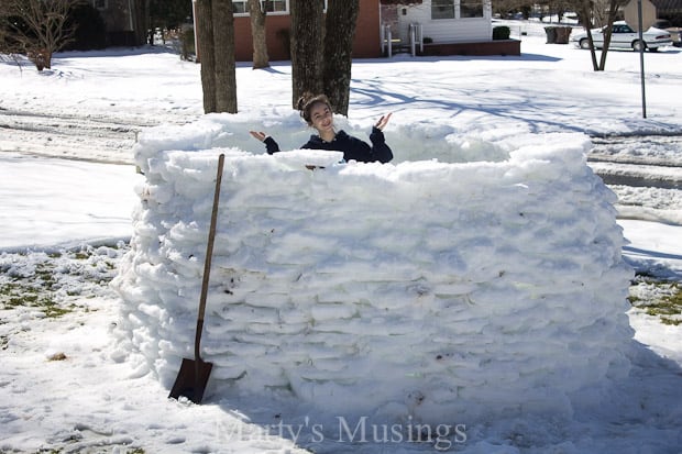 A person that is standing in the snow