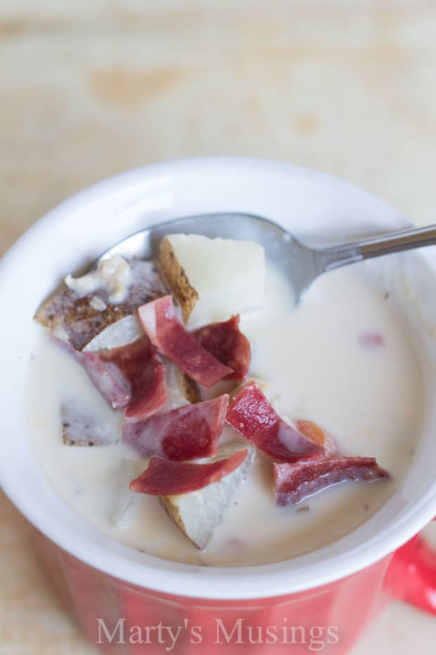 A bowl of fruit on a plate, with Slow cooker and Soup