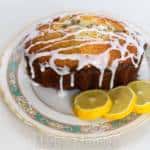 A dessert on a plate, with Bread and Lemon