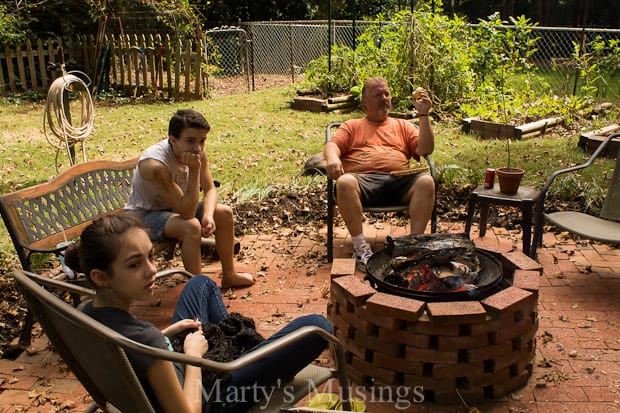 A group of people sitting on a bench