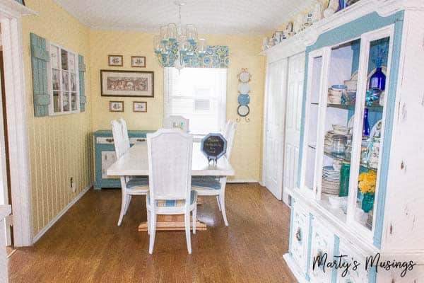 Kitchen with yellow walls and blue accents