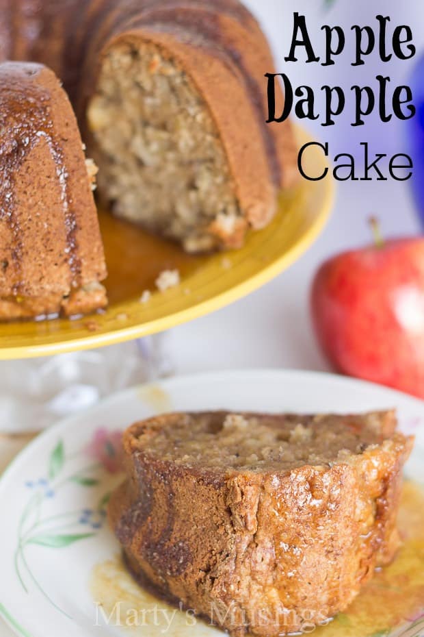 A piece of cake on a plate, with Apple cake