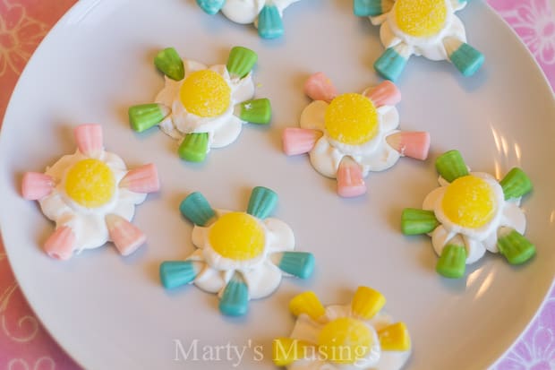 A plate of birthday cake on a table, with Royal icing and Sugar