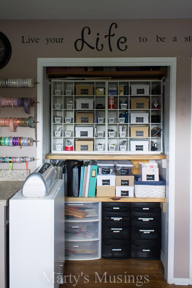 Closet filled with craft storage and supplies