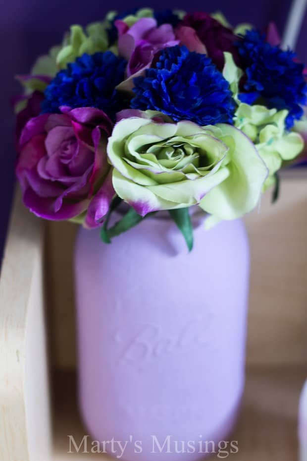 A vase filled with purple flowers