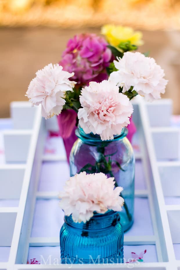 A bouquet of flowers in a vase on a table