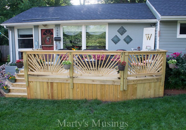 Newly built deck on front of ranch style home