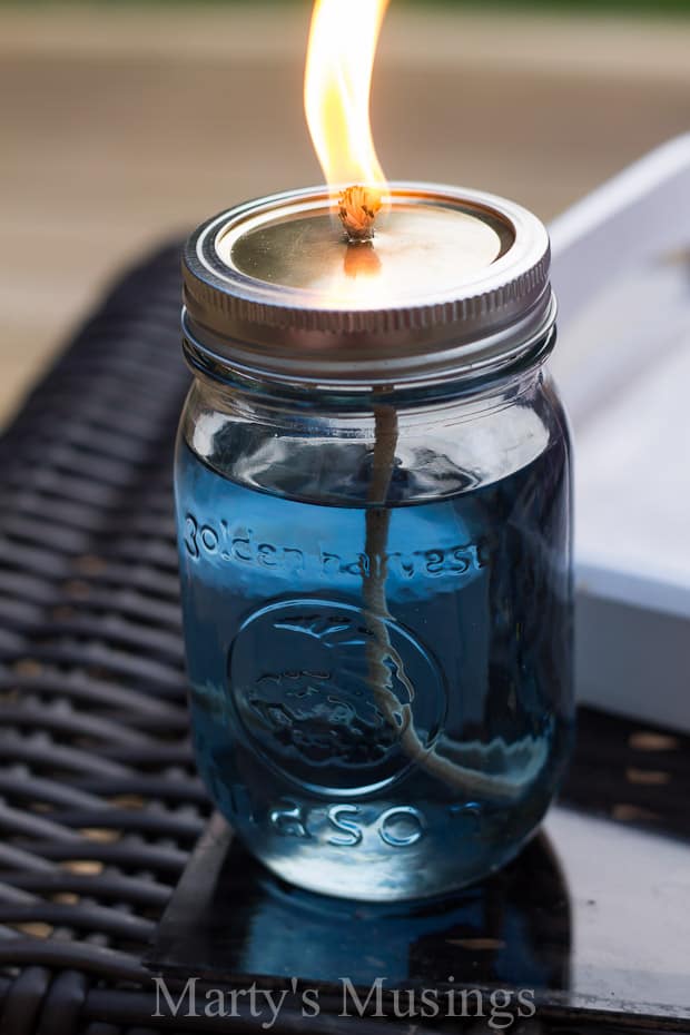 lighted DIY Citronella Candle on table - Marty's Musings