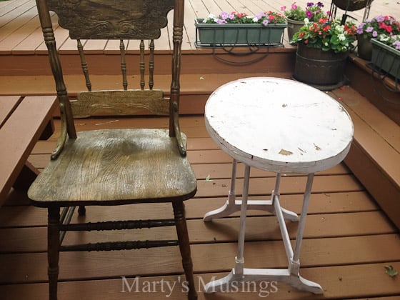 A chair sitting in front of a wooden table