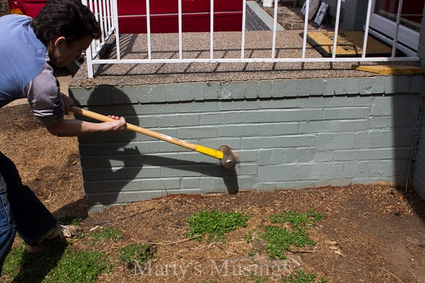 A person swinging a baseball bat