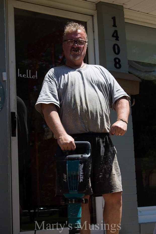 A man standing in front of a building