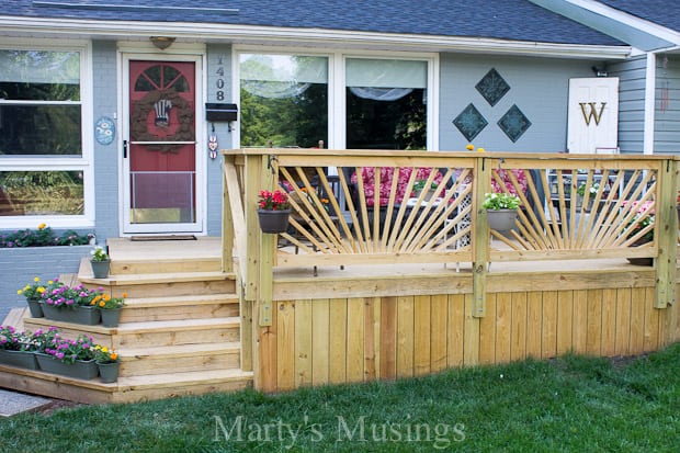 Unstained deck with sunburst deck railing