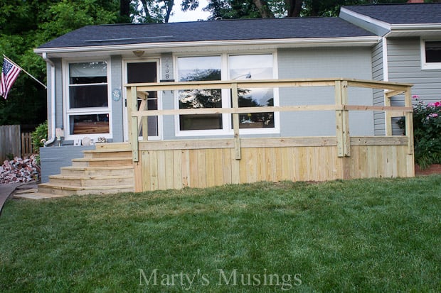 Unfinished deck in front of house