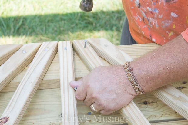 Nailing wood pickets to deck railing